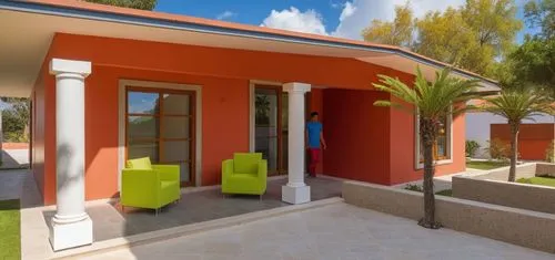 UNA CASA ESTILO MEXICANO, CON COLORES VIBRANTES, USO DE CANTERA,PISOS DE BARRO ROJO, TABIQUE Y ELEMENTOS REGIONALES MEXICANOS, UBICADA EN UN ENTORNO CAMPIRANO, CON COLUMNAS CIRCULARES DEE CONCRETO, AR