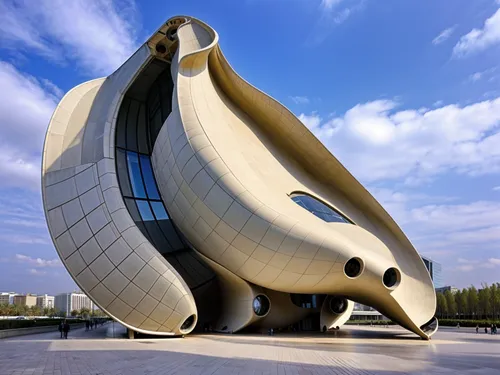 futuristic art museum,futuristic architecture,morphosis,calatrava,soumaya museum,tianjin,futuroscope,esteqlal,guggenheim museum,modern architecture,niemeyer,bunyodkor,arhitecture,skolkovo,zhengzhou,youzhou,baku,tempodrom,safdie,astana