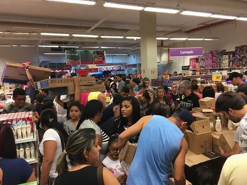 banana box market,teraladina,crowded,black friday,toy store,supermarket,woman shopping,commerce,grocery store,large market,aisle,minimarket,retail,the sale,mail flood,black friday social media post,party supply,outlet store,consumerism,store