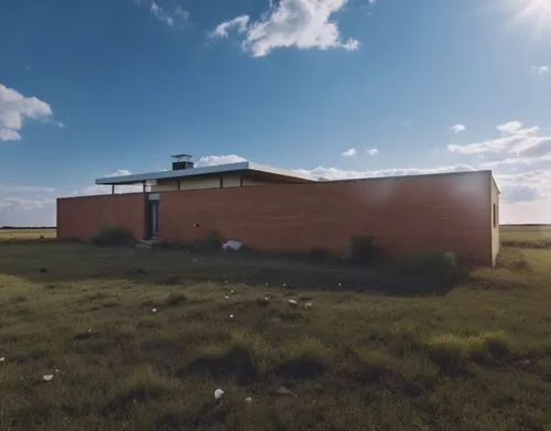 an old building in the middle of an open field,wanuskewin,siksika,dunes house,tuktoyaktuk,marfa,kainai,batoche,blockhouse,prairie,field barn,arviat,360 ° panorama,cube house,whiteclay,minidoka,scheffe