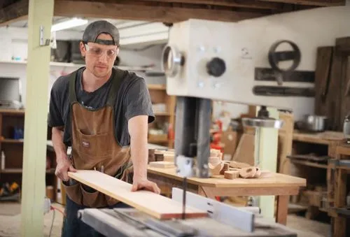 woodworker,a carpenter,carpenter,woodworking,craftsman,metalsmith,hatmaking,sculptor ed elliott,wood shaper,tinsmith,woodwork,blue-collar worker,tradesman,crosscut saw,hat manufacture,craftsmen,jointer,wooden frame construction,sawhorse,bandsaw