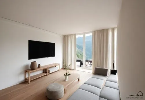 From the sale you can see a bit of the terrace chairs and the pool with a view of the mountains.,a living room has white walls and wooden flooring,modern room,natuzzi,lefay,livingroom,smartsuite,moder