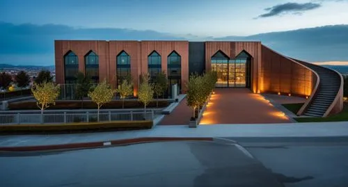 HUGE SPACE 
LARGE ENTRANCE
ARCHES 
REFER REFERENCE
REALISTIC VIEW
DAY TIME
,the building is made from a brick structure with a triangular design,spu,kettunen center,gcu,bvu,biotechnology research inst