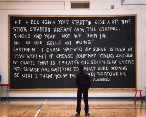 At a high school, a shy student gets inspired by a motivational quote, 'Wanna be startin' somethin'? Chase your dreams and prove them wrong.',chalkboard,chalkboard background,chalk board,letter board,