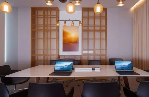 two laptops sitting on a table in an office,blur office background,modern office,meeting room,search interior solutions,board room,working space,conference room,creative office,serviced office,steelca