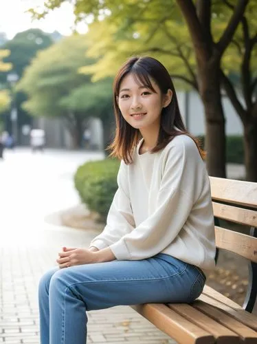 young japanese woman sits on a bench,a woman wearing jeans sitting on top of a wooden bench,koreana,kaori,soghanalian,korea,korean,girl sitting