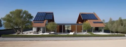  a modern community house  " solar panels on flat roofs". ,a couple of houses with some very nice solar panels on top,solar panels,passivhaus,solarcity,solar photovoltaic,solar energy,solar power,Phot