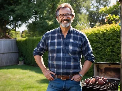 Middle-aged father, casual wear, relaxed posture, smiling face, messy brown hair, glasses perched on nose, slight beard, plaid shirt, dark blue jeans, sneakers, holding a football, standing in a backy