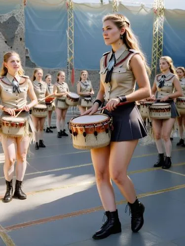 female-led performance of the drumming corps at Military Academy of Modena and Nunziatella,young women in uniforms are holding drums in their hands,haka,majorettes,leonas,militares,batala,militaires,P