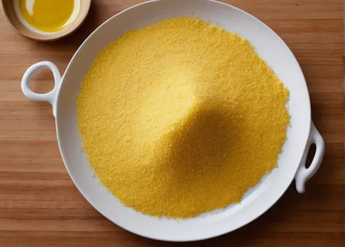 Create a poem about the golden color and silky texture of semolina.,oven polenta,semolina,cornmeal,polenta,hollandaise sauce,nutritional yeast,cornbread,béarnaise sauce,all-purpose flour,creamed corn,