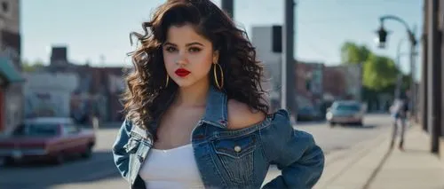 Selena Gomez, Chola-inspired outfit, young adult woman, curly dark brown hair, bold eyebrows, bright red lips, golden hoop earrings, off-the-shoulder denim jacket, white crop top, high-waisted distres