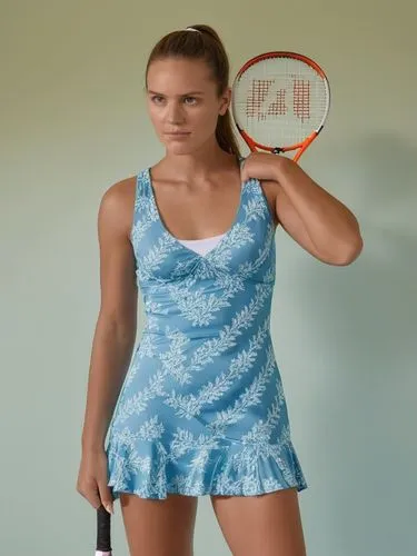 a woman with a tennis racquet standing in a room,there is a woman holding a tennis racket,radwanska,wozniacki,rybarikova,safarova,krunic,vaidisova,Photography,General,Realistic