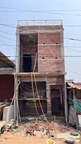 prefabricated buildings,brick-kiln,dilapidated building,old brick building,automobile repair shop,antique construction,brick-laying,nonbuilding structure,building materials,building construction,building work,bulandra theatre,dilapidated,factory bricks,chaumukkha mandir,premises,destroyed area,demolition work,old buildings,fire damage