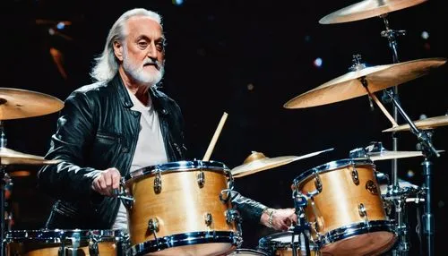 Fleetwood Mac's drummer, Mick Fleetwood, standing, mature man, (60yo), detailed wrinkles, gray hair, beard, sunglasses, black leather jacket, white shirt, blue jeans, boots, drumsticks in hand, playin