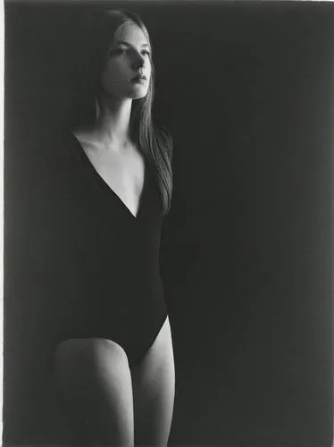 Black and white photo, strongly lightened. Female model.,a woman wearing a bodysuit looking down,rhye,daveigh,blumenfeld,veruschka,lubitel 2,dorothee,Photography,Black and white photography,Black and 