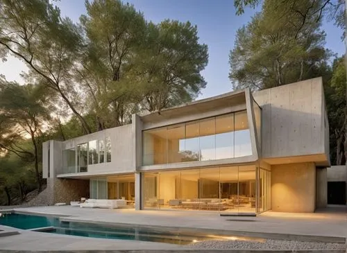 In a spacious masterful study, a minimalist house with a minimalist style exudes relaxation and beauty. The facade of the house is adorned with intricate concrete facades and plush carpet, with polish