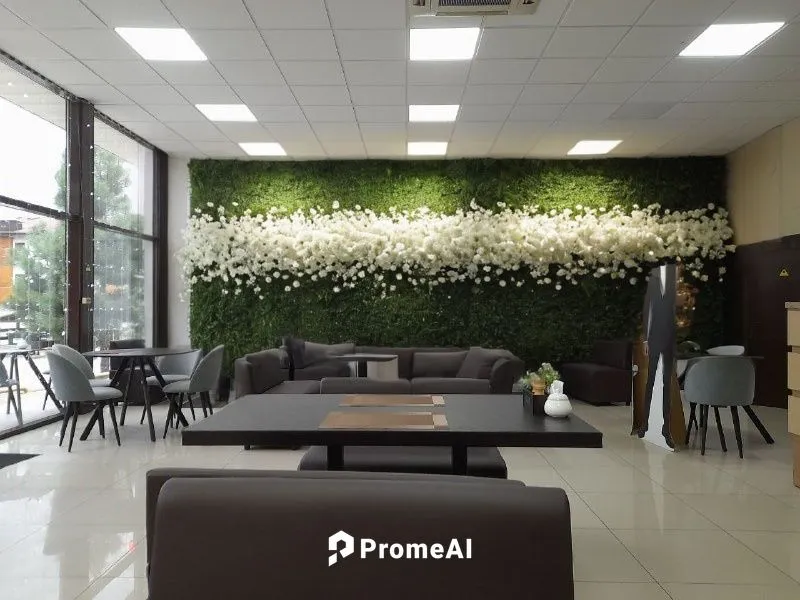 Replace the beautiful lush grass with an entire wall from floor to ceiling, decorated with large white flowers. Add beautiful spotlights along the top of the wall,serviced office,meeting room,interior