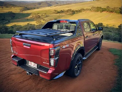 a dirt carpark over looking a valley and rolling hills. landscape to be australian,ford ranger,ford super duty,ford f-550,ford f-350,ford f-series,ford cargo,ford truck,nissan titan,pickup-truck,truck