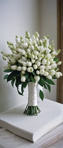 A bouquet of white buds lay on the altar, symbolizing purity and new beginnings. Write a wedding vow.,white tulips,flower arrangement lying,lily of the valley,tuberose,madonna lily,white plumeria,flow