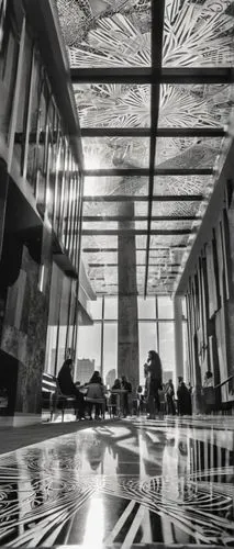 Modern interior design exhibition, New York City, March 21, morning light, Manhattan skyscraper, glass ceiling, polished concrete floor, sleek metal pillars, minimalist decor, geometric patterns, luxu