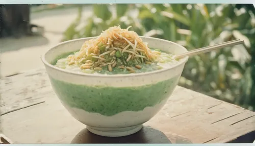 Imagine enjoying a refreshing bowl of cendol on a scorching summer day.,cendol,alfalfa sprouts,rice vermicelli,ais kacang,wheatgrass,pecel,matcha powder,green curry,vermicelli,garden cress,sprout sala