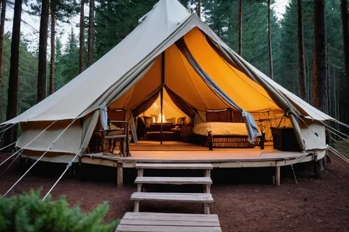 canvas tent, cozy interior, wooden furniture, rustic style, warm lighting, surrounded by forest, serene atmosphere, sunset glow, campfire outside, soft textures, detailed fabric patterns, natural mate