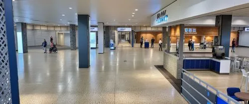  printer,station concourse,station hall,train station passage,south station,baggage hall,french train station,airport terminal,queue area,ceramic floor tile,empty hall,berlin brandenburg airport,union