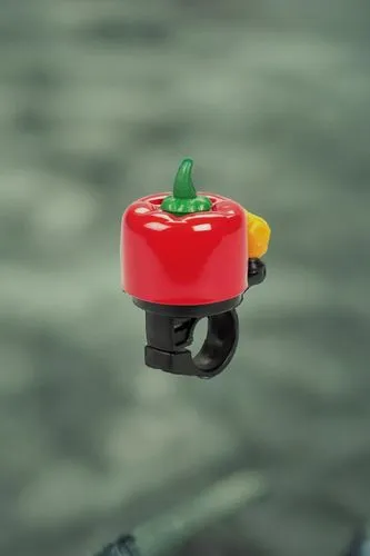 put this bicycle bell on a bicycle,roma tomato,red bell pepper,amphicar,two-handled sauceboat,bellpepper,red bell peppers,lego car,tomato,miniature car,mini drone,red chili pepper,spoiled red bell pep