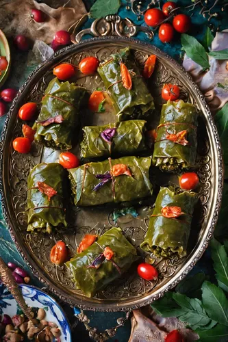 Create a recipe blog post titled 'Spicy Dolma Delight: A Taste of Mediterranean Cuisine.',wild grape leaves,vine leaves,grape leaves,spanakopita,dolma,saag,kabab koobideh,spinach dumplings,rajas con c