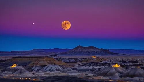 """National Geographic Your Shot on Instagram: """"Photo by @navidbaraty The autumn harvest moon sets just before sunrise over the Bisti Badlands of New Mexico. The badlands are an…""""""",moon valley