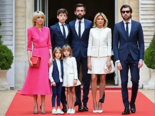 Ms Laurence Auziere Jourdan (second from left), daughter of Brigitte Trogneux, together with her husband Guillaume and their children arriving at the Elysee Palace for the presidential handover ceremo