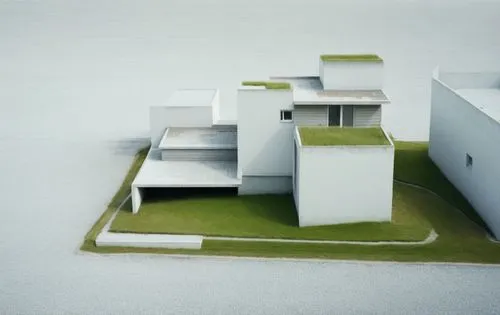 Realistic image replaces the brown color replaces it with grass, maintain contour lines, White concrete buildings,an island with grass that is growing on top of it,lasdun,corbu,cubic house,corbusier,m