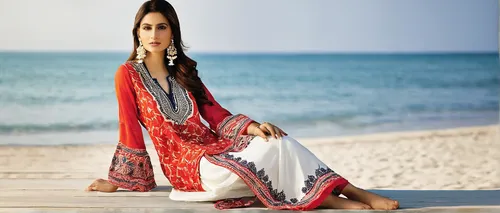 Describe a trendy Sana Safinaz outfit suitable for a beach party.,ethnic design,women clothes,women fashion,sarong,abaya,raw silk,sari,ikat,indian girl,bridal clothing,ladies clothes,saree,women's clo