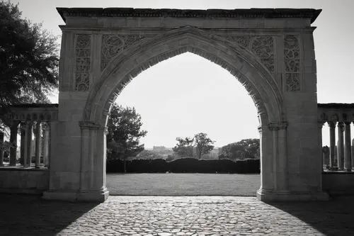 Roman arch, rounded arch, pointed arch, horseshoe arch, multifoil arch, Tudor arch, Islamic arch, Gothic arch, monumental entrance, ornate decoration, stone structure, ancient ruins, historical landma