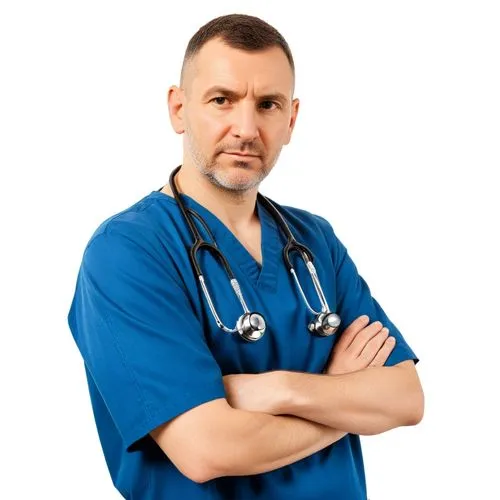 the doctor is wearing a blue uniform and smiling,male nurse,healthcare worker,physician,docteur,healthcare professional,doctorandus