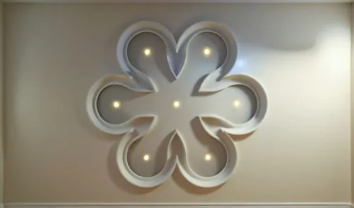 Converting the layout of a gypsum arch to an entrance to a room,a large metal flower design in a living room,wall light,quatrefoils,sconce,ensconce,wall lamp,fleur de lis,Photography,General,Realistic