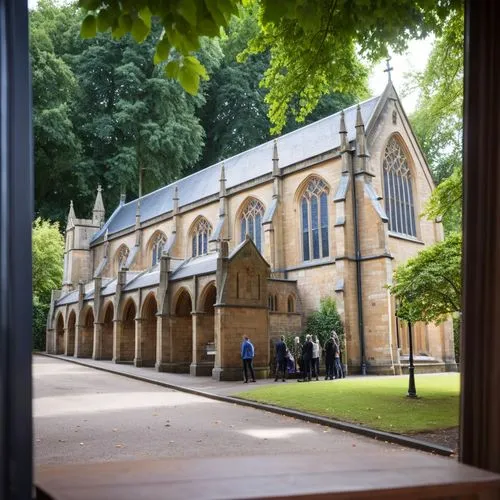 Transform the famous drawing by Bill Denny “Malvern College Chapel” into a contemporary, high-resolution black and white photo in an impressive way.,a view of a large stone building from the outside,p