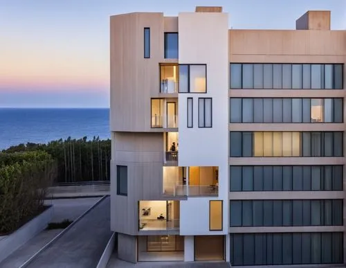 set the cars,there is a tall building with a window,fresnaye,escala,antilla,dunes house,modern architecture,riviera