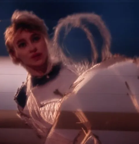 a woman holding a bird and wearing a jacket,ladyhawke,exene,barbarella,mdna,minogue,madge,Photography,General,Cinematic