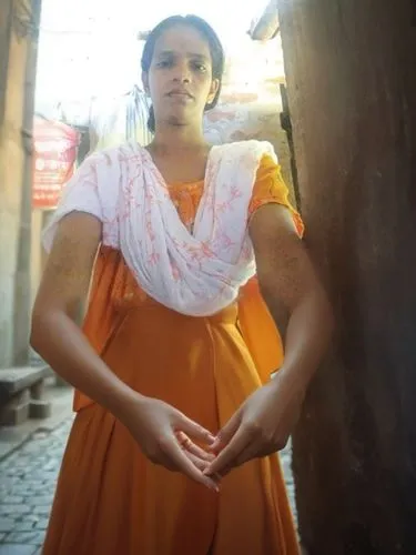 the woman is standing outside posing for a po,abhinaya,shailaja,bhanumathi,roopa,srividya,sivakami