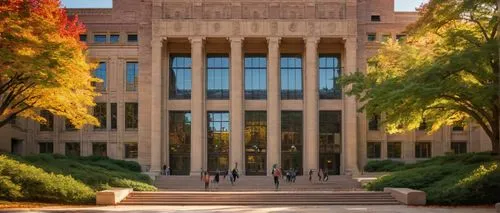 Iowa State University campus, modern brutalist architecture, Beardshear Hall, grand staircase, red brick walls, large windows, concrete columns, lush greenery surrounding, vibrant fall foliage, aftern