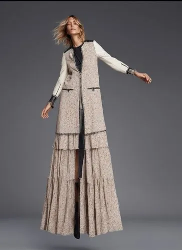 a woman is posing for the camera wearing a dress,tahiliani,a floor-length dress,long coat,vionnet,poiret,imperial coat,Photography,Fashion Photography,Fashion Photography 02