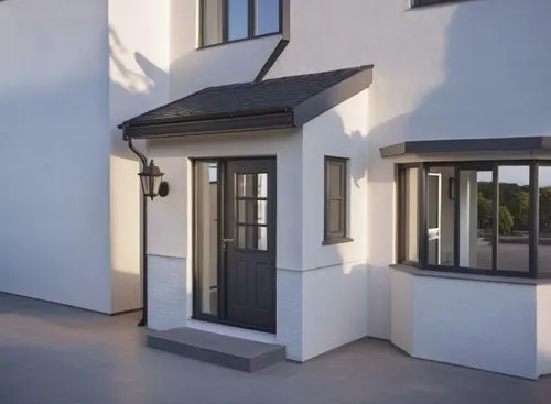 all walls painted white,dormer window,roughcast,stucco frame,encasements,window frames,exterior decoration,winkworth,leaseholds,tobermore,eifs,passivhaus,architrave,gold stucco frame,conveyancing,stuc