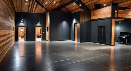 modern recording studio with high angled barn style ceiling, support beams and dark walls,music studio,recording studio,rental studio,home studios,sound studio,studios,aqua studio,music conservatory,h