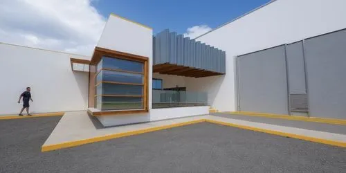 AREA DE CONVIVENCIA, CON PERGOLAS DE CONCRETO, LOSA CON REMATE DE VIGA DE ACERO, ESPEJO DE AGUA ,a man in black shirt standing in front of a building,cubic house,sketchup,cube house,renderings,school 