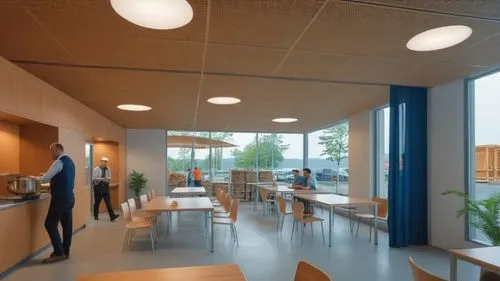 Inside wood,  Employers are working in a production line. The are eating and chatting. The windows are also made of wood. ,school design,arkitekter,staffroom,canteen,daylighting,cafeteria,hospital war