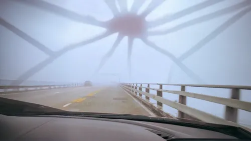 ravenel bridge,wind turbines in the fog,beetle fog,foggy,high fog,foggy day,tangshan railway bridge,skyway,the fog,dense fog,fog,veil fog,north american fog,fog up,highway bridge,vanishing point,cable-stayed bridge,ring fog,bridge,morning fog