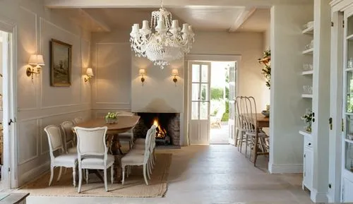 cozy dining room, classic wall panels, lots of details, chandelier, fireplace with fire, wall sconces. light floor, painted walls, interior decor, white doors,this is a dining area with many chairs,br