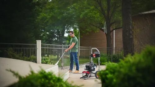 string trimmer,walk-behind mower,longboarding,lawn mower robot,inline skates,longboard,mowing the grass,lawnmower,battery mower,grass cutter,skateboarding equipment,tilt shift,dad and son outside,trai