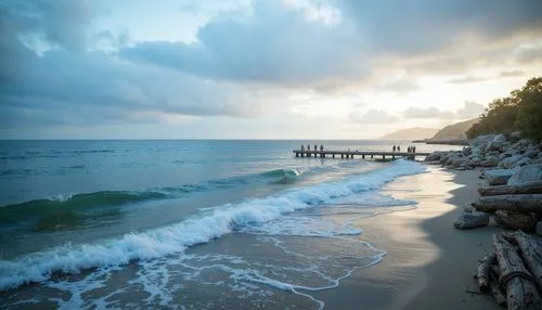 Calming oceanic scenery, serene blue hues, gentle waves, cloudy sky, warm sunlight, soft misty atmosphere, beachside wooden docks, weathered driftwood, natural stone formations, tranquil ambiance, sha